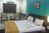 Bedroom Hotel Tulsi Residency