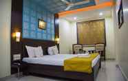 Bedroom 7 Hotel Tulsi Residency