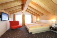 Phòng ngủ Apparthotel Feehof Saas-Fee