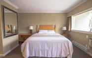 Bedroom 7 Okanagan Royal Park Inn by Elevate Rooms