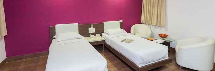 Kamar Tidur Asiatic Pride Resort