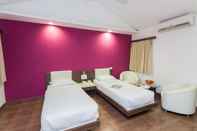 Kamar Tidur Asiatic Pride Resort