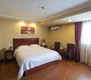 Bedroom 4 GreenTree Inn Suzhou Kunshan Paris Spring Express Hotel