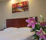 Bedroom 2 GreenTree Inn Suzhou Kunshan Paris Spring Express Hotel
