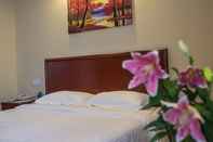 Bedroom GreenTree Inn Suzhou Kunshan Paris Spring Express Hotel