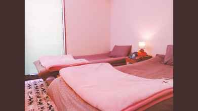 Kamar Tidur 4 Rainbow Guesthouse