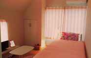 Kamar Tidur 5 Rainbow Guesthouse