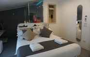 ห้องนอน 3 iConic B&B Wellness Resort