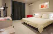 Kamar Tidur 3 Jinjiang Inn Huizhou Qiaodong River View Hotel
