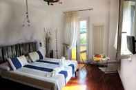 Phòng ngủ Vistazzurra B&B