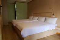 Phòng ngủ Wangtaparb Resort