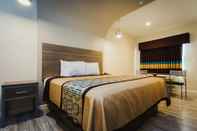 Bedroom Scottish Inns & Suites Atascocita