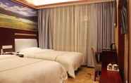 Bedroom 6 Yiwu Baide Theme Hotel