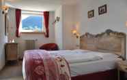 Bedroom 7 Alpenlife Hotel Someda
