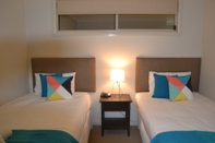 Bilik Tidur Cypress Waterfront Apartments