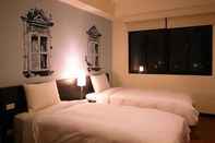 Bedroom Quemoy Hotel
