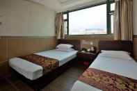 ห้องนอน B&B Mongkok Hotel