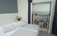 Bedroom 3 Seaside Luxury Suites