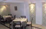 Restaurant 4 Appart Hotel Castilia Suites