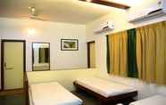 Bedroom 2 Dhanashree Hospitality - Bar,Restaurant & Lodging