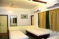 Bedroom Dhanashree Hospitality - Bar,Restaurant & Lodging