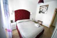 Phòng ngủ B&B Pignatelli