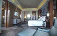 Bedroom 4 Universal Hotel Urumqi