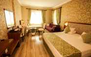Bedroom 6 Tughan Hotel