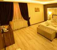 Kamar Tidur 4 Antiochos Hotel