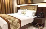 Kamar Tidur 3 Vybrant Hotels