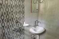 In-room Bathroom Vistara Home Stay