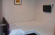 Kamar Tidur 3 Dynasty Commercial Hotel