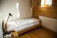 Bedroom Hotel Alpenrose beim Ballenberg