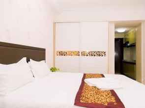 Bilik Tidur 4 Weihai Dushang Huayi Apartment Hotel