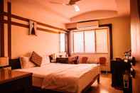 ห้องนอน Sai Orbit Serviced Apartments
