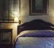 Bedroom 6 Ostra Menalon Luxury Suites