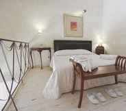 Bedroom 2 Ostra Menalon Luxury Suites