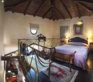 ห้องนอน 7 Ostra Menalon Luxury Suites
