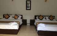 Kamar Tidur 4 Sun Leo Hotel