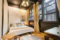 Kamar Tidur Tongli 1917 Best South Boutique Inn