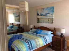 Kamar Tidur 4 90 Mile Beach House & Villas