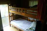 Bedroom OKINAWA MOTOBU GUESTHOUSE - Hostel