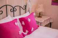 Bilik Tidur Flower Wall B&B