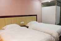 Bilik Tidur Weihai In-Tone Inn