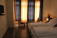 ห้องนอน Hotel Kasdar