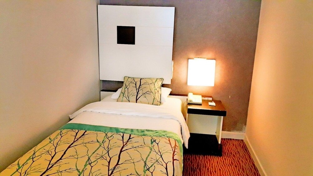 Kamar Tidur 4 Blue Garden Hotel