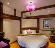 Bedroom 3 The Purplevine Inn Lijiang