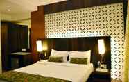 Kamar Tidur 6 Hotel Vinamra Residency