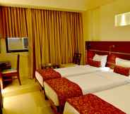 Bedroom 3 Hotel Vinamra Residency