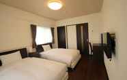 Bedroom 6 Class Inn Nago